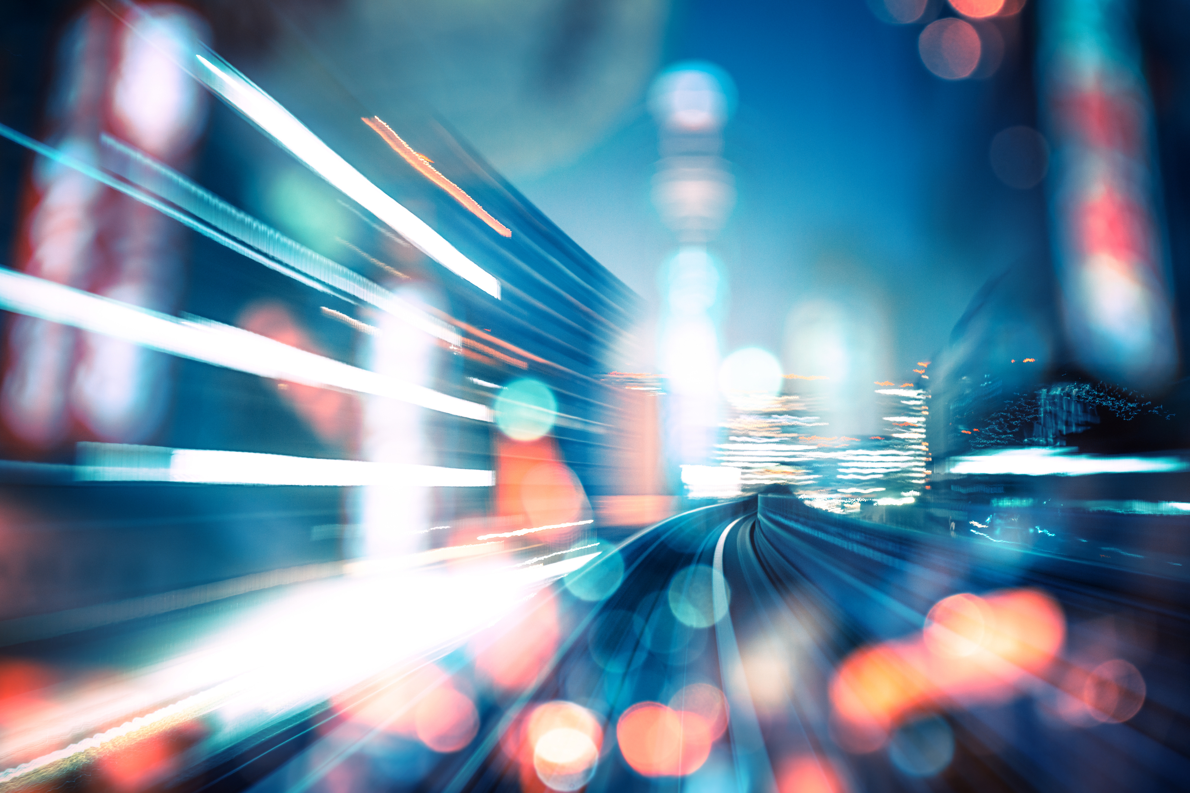 abstract motion-blurred view from the front of a train in Tokio, Japan